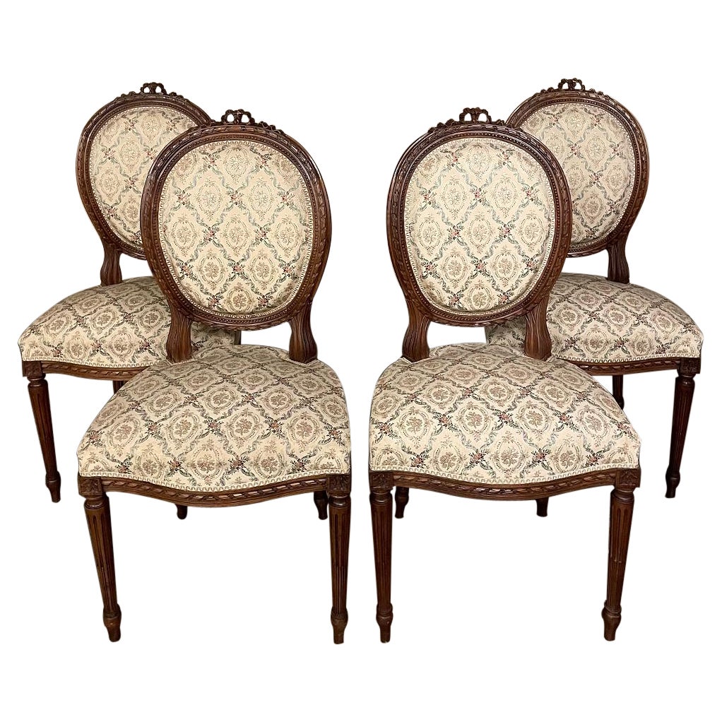 Set of Four 19th Century French Louis XVI Walnut Chairs For Sale