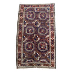 Tapis persan ancien de forme baluchon, vers 1900