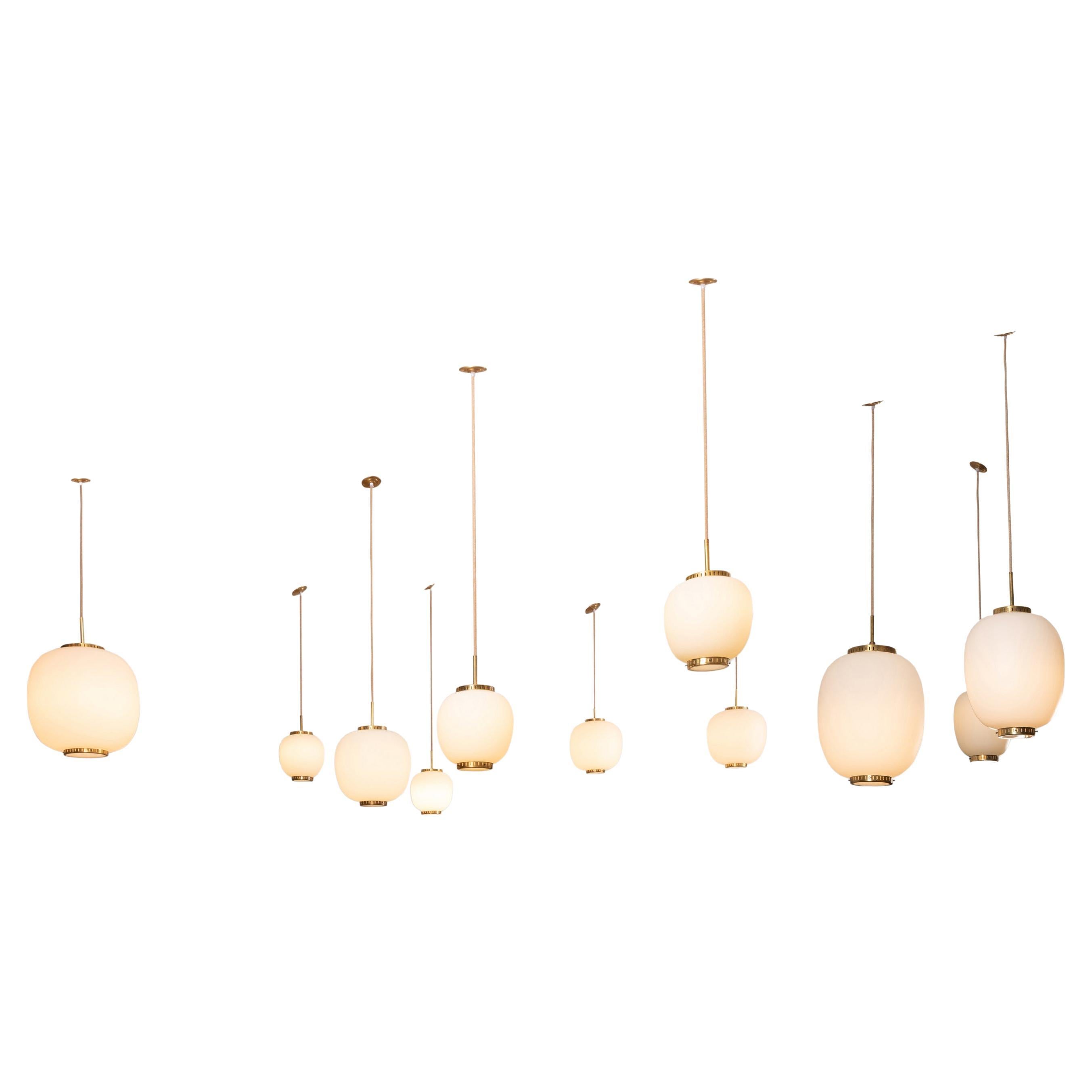 Collection of 10 Opaline Glass and Brass Ceiling Fixtures, Bent Karlby for Lyfa