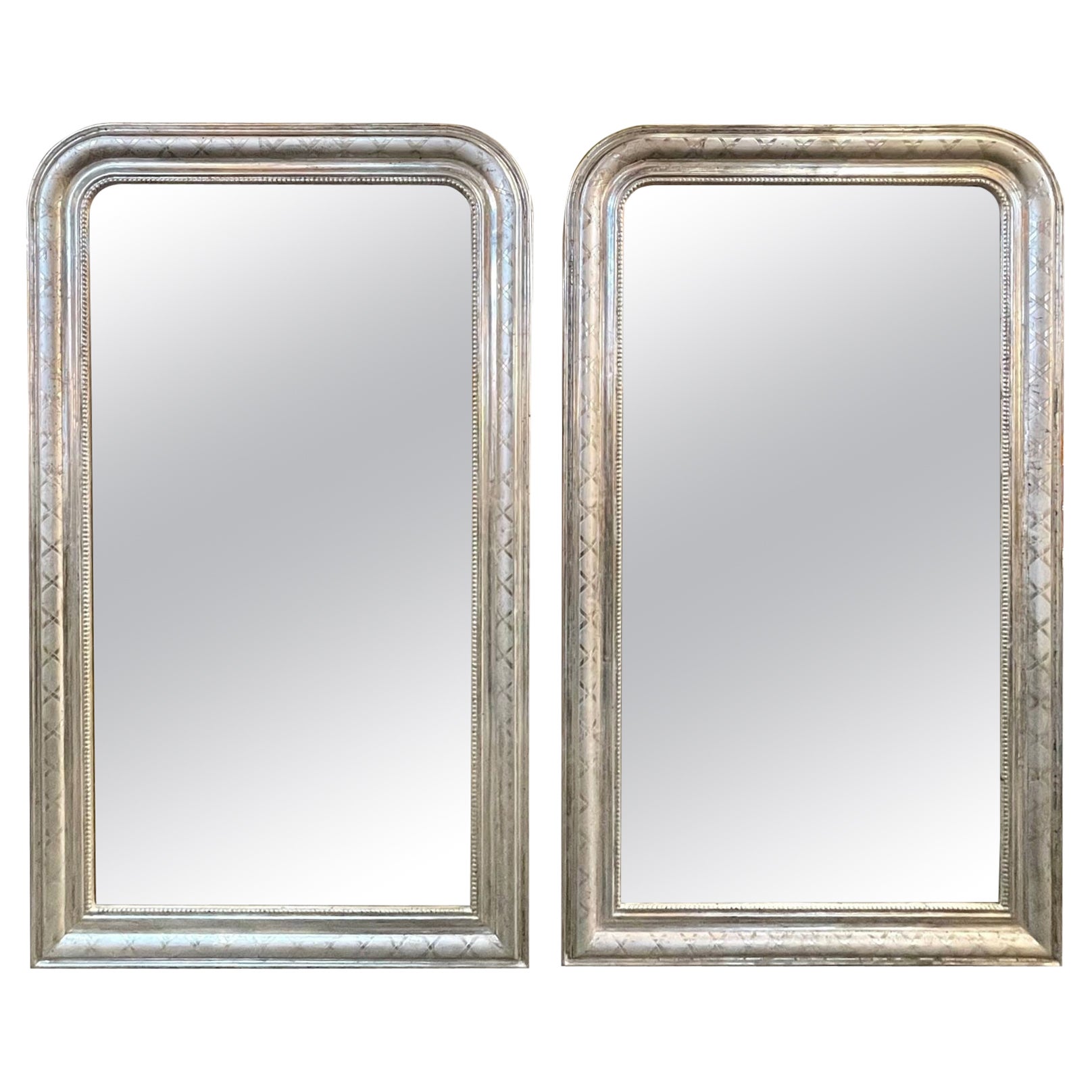 Pair of French Silver Leaf Louis Philippe Mirrors with X Pattern