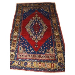 Ancien tapis de village turc Taspinar à motifs de médaillons classiques