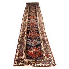 Antique Kurdish Runner with Small Medallion Design, circa 1920