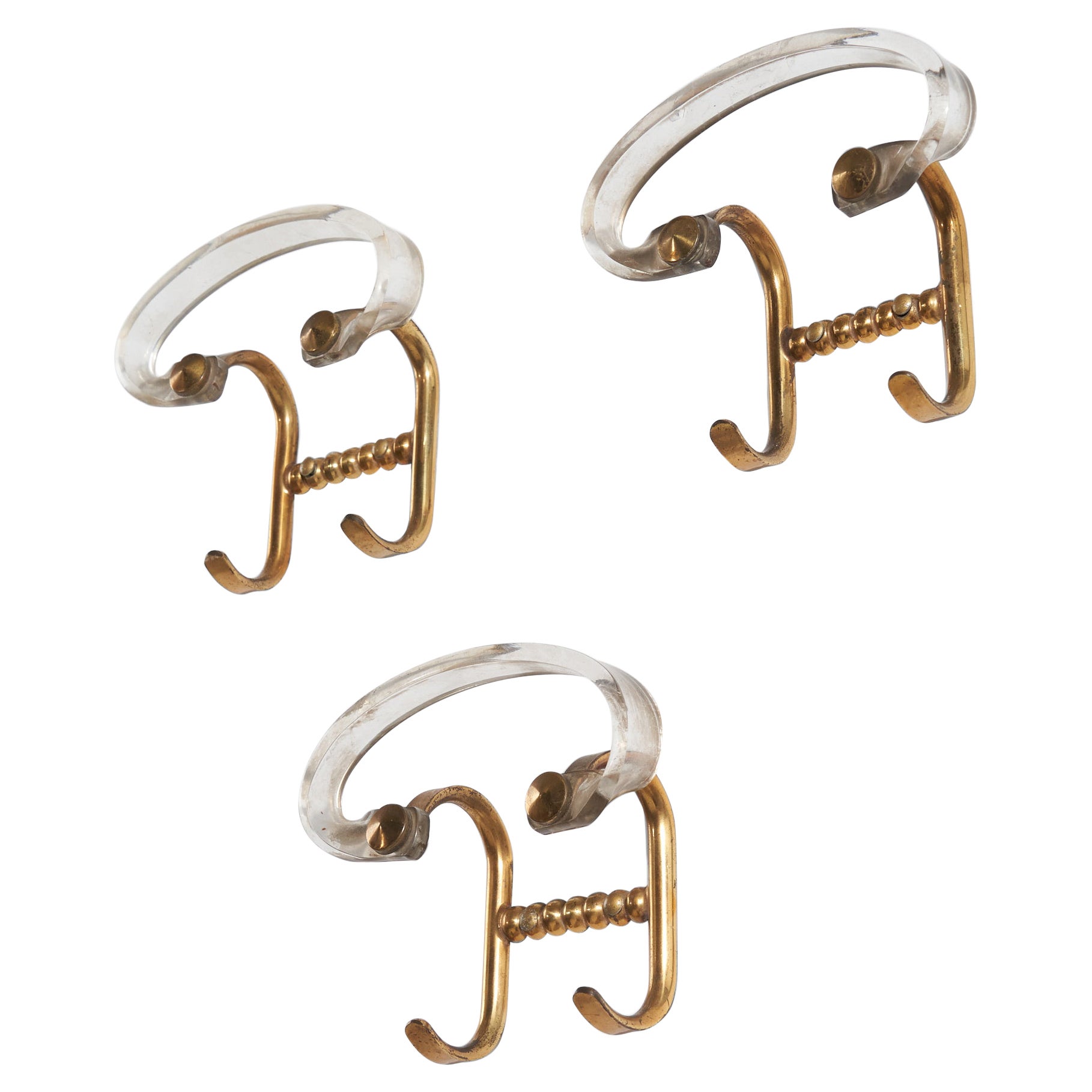 Italian Designer, Set of Three Coat Hangers, Brass, Acrylic, Italy, 1940s For Sale