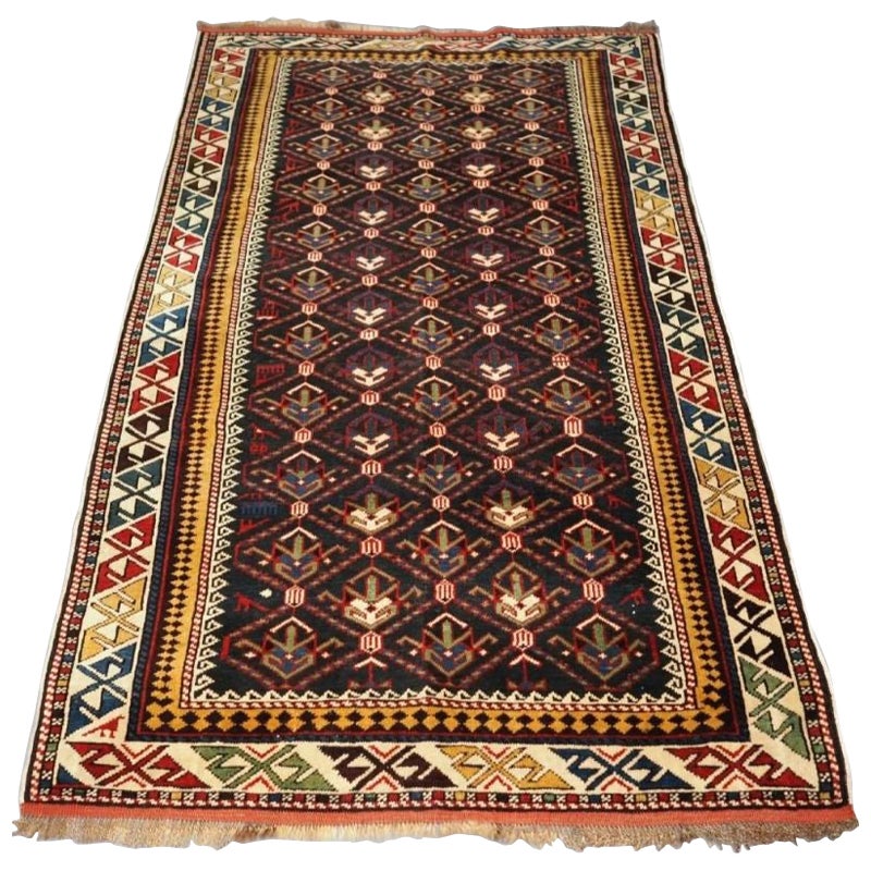 Antiker kaukasischer Daghestan-Teppich mit Gittermuster, um 1900