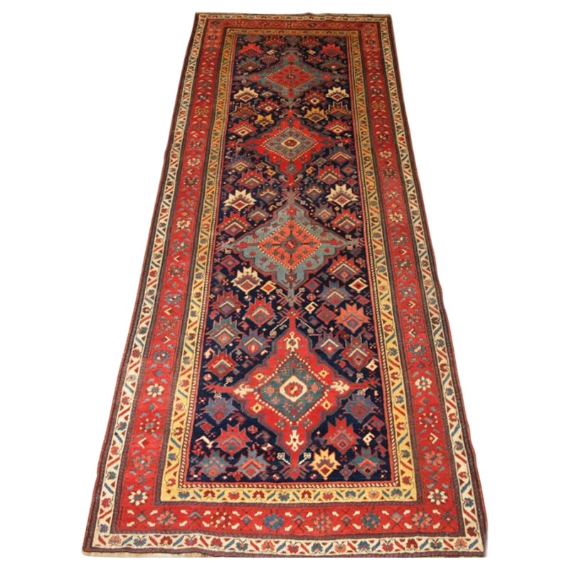 Antique South Caucasian Runner with Repeat Medallion Design For Sale