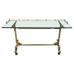 Superbe table console rectangulaire en verre et laiton de style Mastercraft