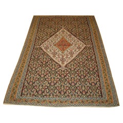 Antique A Fine Persian Senneh Kilim with a Traditional Medallion Design