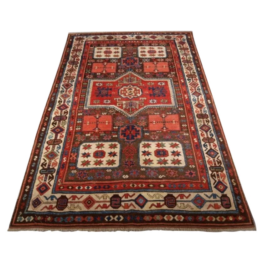 Ancien tapis turc d'Antep au design rare
