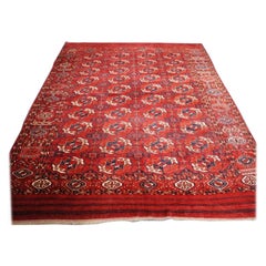 Tapis turkmène ancien Tekke avec 4 rangées de 10 Guls