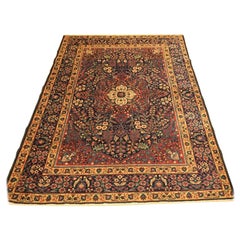 Tapis Tabriz ancien à motifs floraux classiques