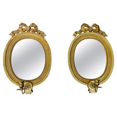 19th - 20th Century Swedish Gustavian Pair of Oval Gilded Wood Glass Mirrors