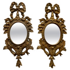 Pair of Oval Rococo Gilt Wall Mirrors