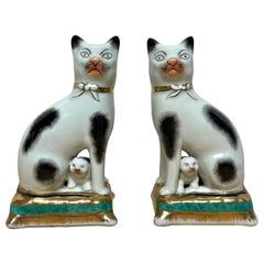 Pair of Staffordshire Figures of Seated Black & White Cats with Kittens