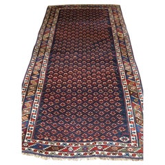 Antique Kurdish Long Rug with a Fine Shrub Design