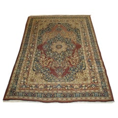 Tapis antique de Tabriz de conception classique avec un médaillon central 