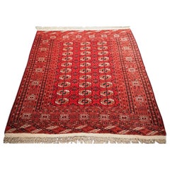 Tapis turkmène antique Tekke au design traditionnel