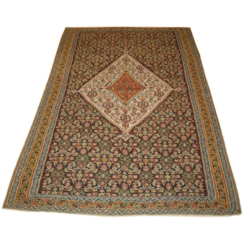 A Fine Persian Senneh Kilim with a Traditional Medallion Design For Sale