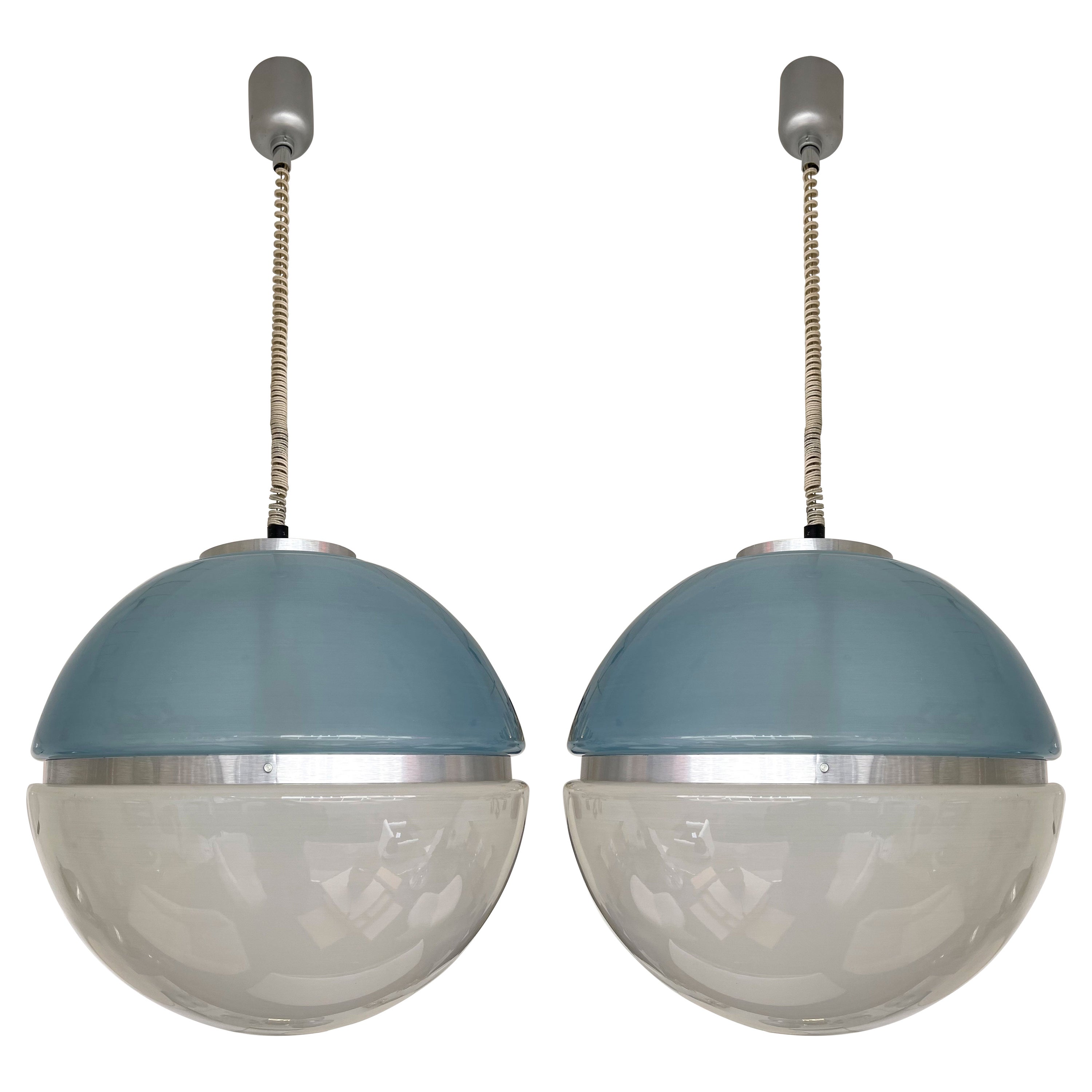 Mid-Century Modern Space Age ball ceiling pendant light lamp chandelier in a rare blue and clear perspex lucite methacrylate attributed to the italian editor Stilux Milano. Famous design like Reggiani, Sciolari, Francesco Buzzi Ceriani, Stilnovo,