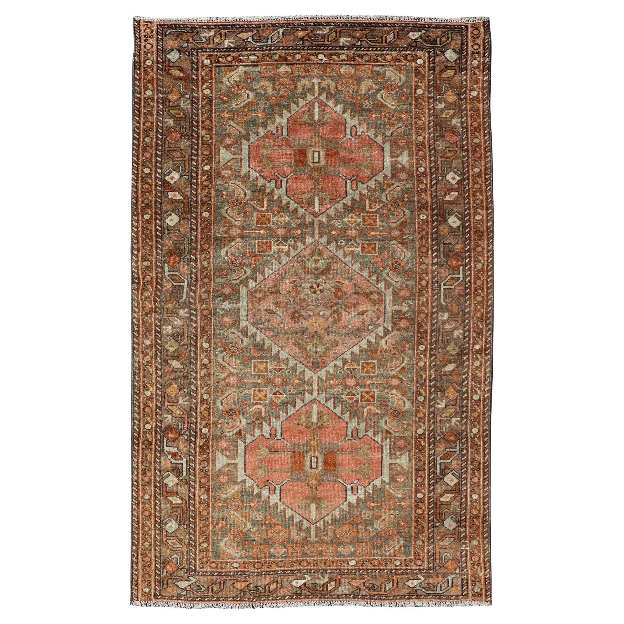 Antique Persian Hamedan in Rustic Earthy Tones With Tribal Medallions For Sale
