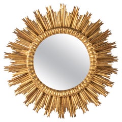 Grand miroir Sunburst en bois sculpté et doré, de style moderne du milieu du siècle dernier