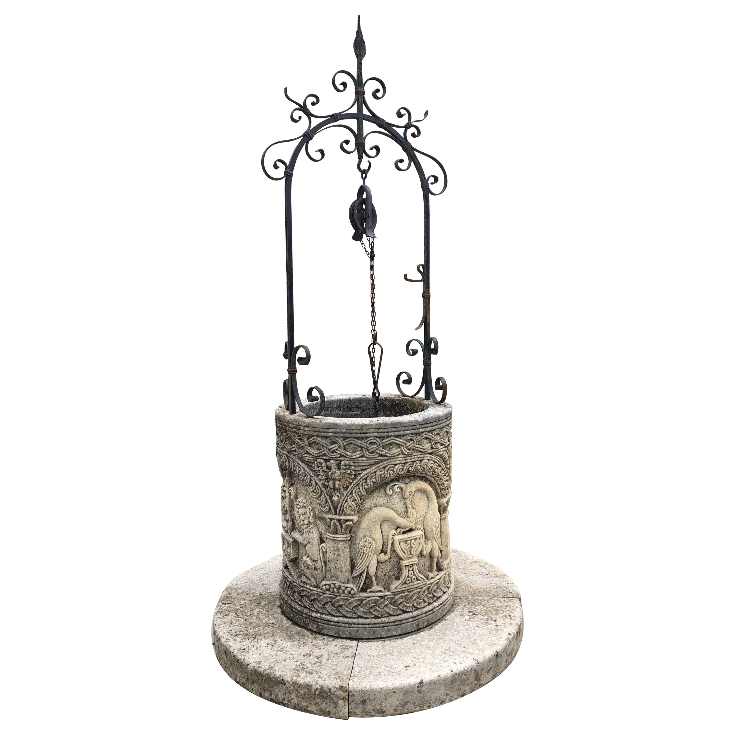 Carved Byzantine Style Limestone Wellhead with Scrolled Ironwork