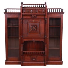 Antique Victorian Eastlake Carved Walnut Double Bookcase with Secretary Desk