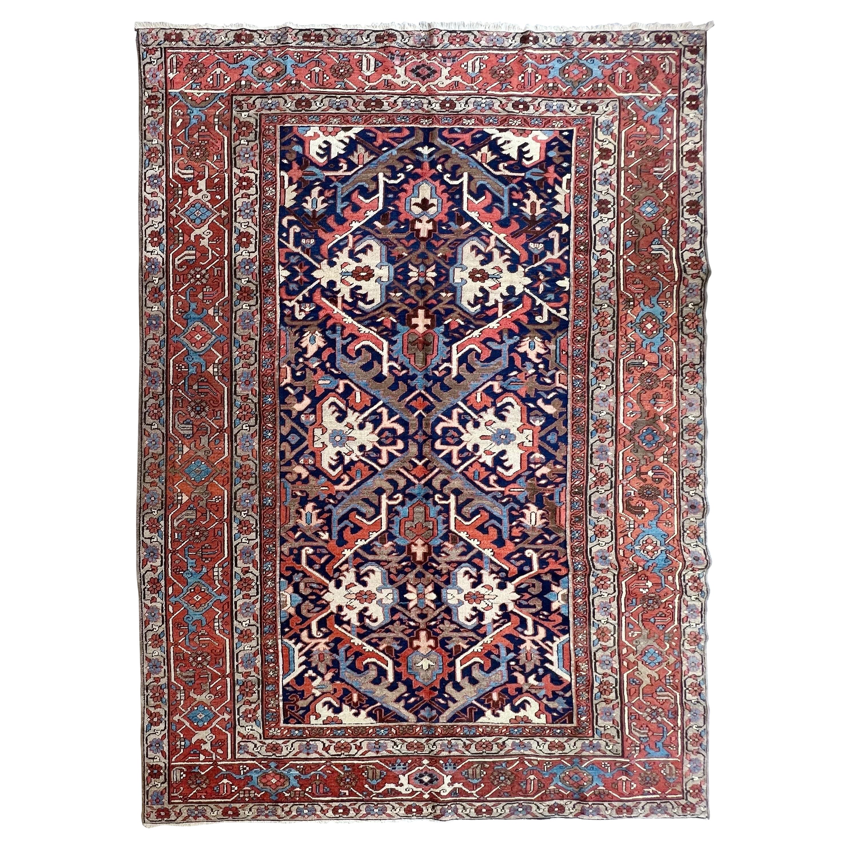 Antique Persian Heriz Rug with a Blue Field, All-Over Pattern, circa 1920s