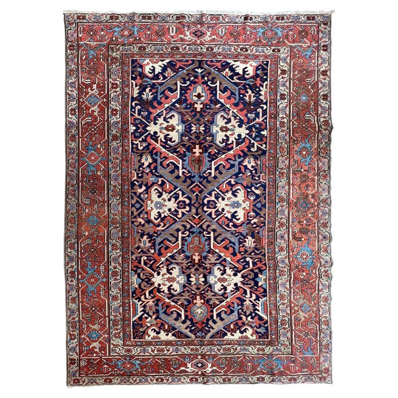 Antique Persian Ghazvin Rug with Flower Medallion over a Blue Field ...