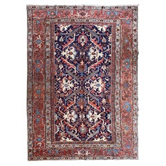 Antique Persian Heriz Rug with a Blue Field, All-Over Pattern, circa 1920s