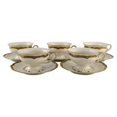 Kpm, Berlin, Five Royal Ivory Teacups with Saucers in Cream-Colored Porcelain