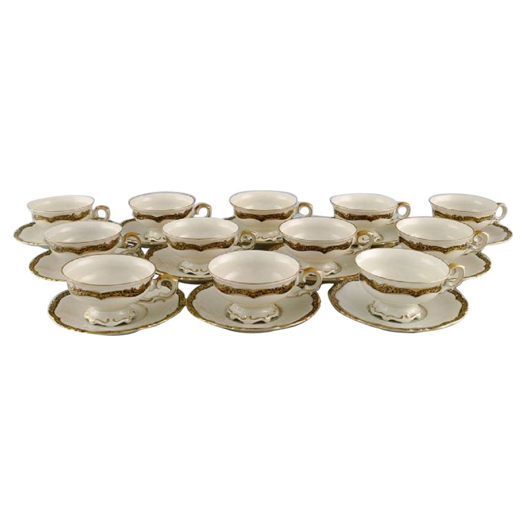 KPM, Berlin, Twelve Royal Ivory Tea Cups with Saucers in Cream-Colored Porcelain For Sale