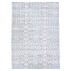 Handgefertigter blauer Wollteppich im modernen schwedischen Stil mit geometrischem Muster