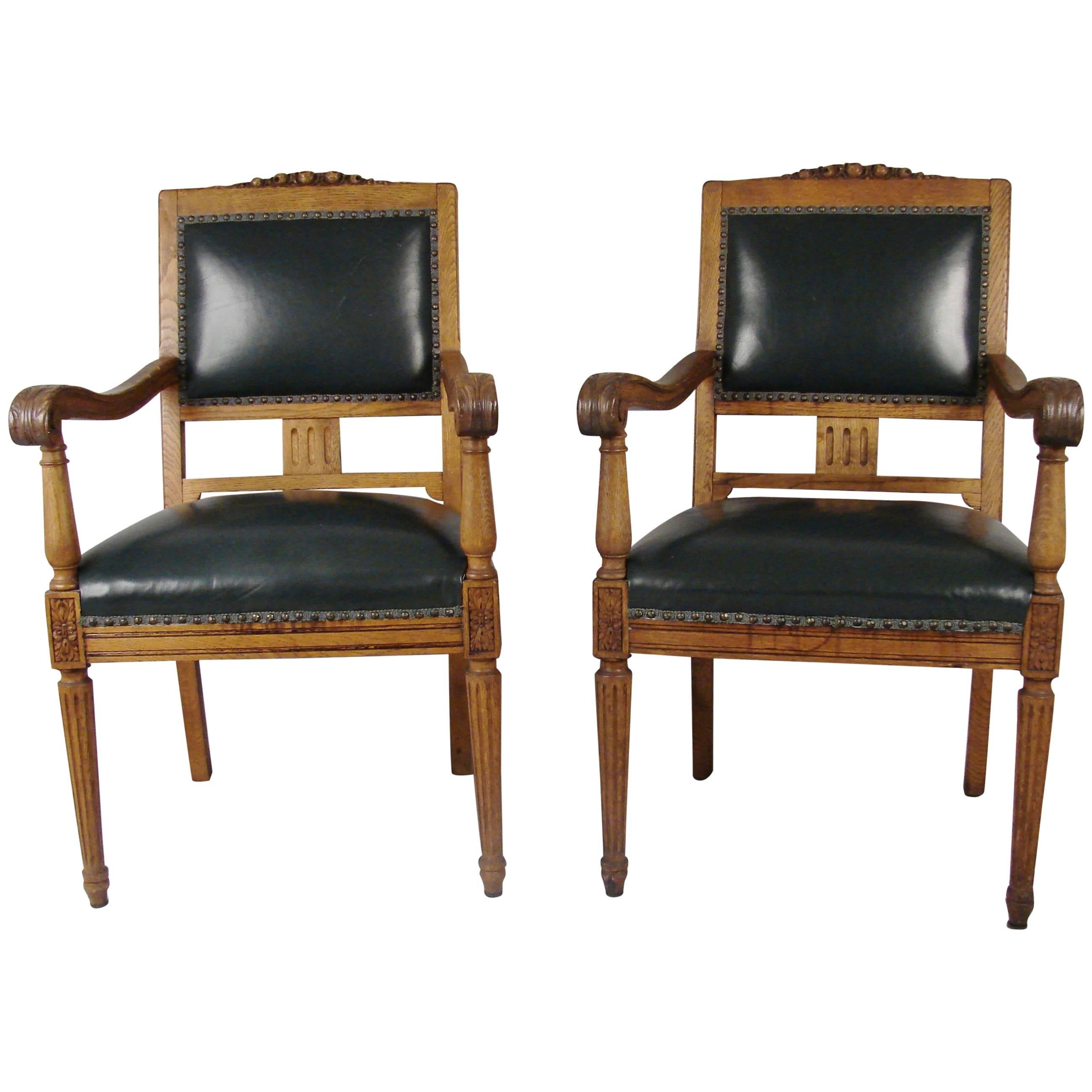 Pair of Large Scale German Oak Leather Upholstered Armchairs