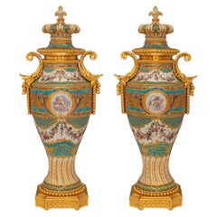Pair of French 19th Century Louis XVI St. Sèvres Porcelain & Ormolu Lidded Urns