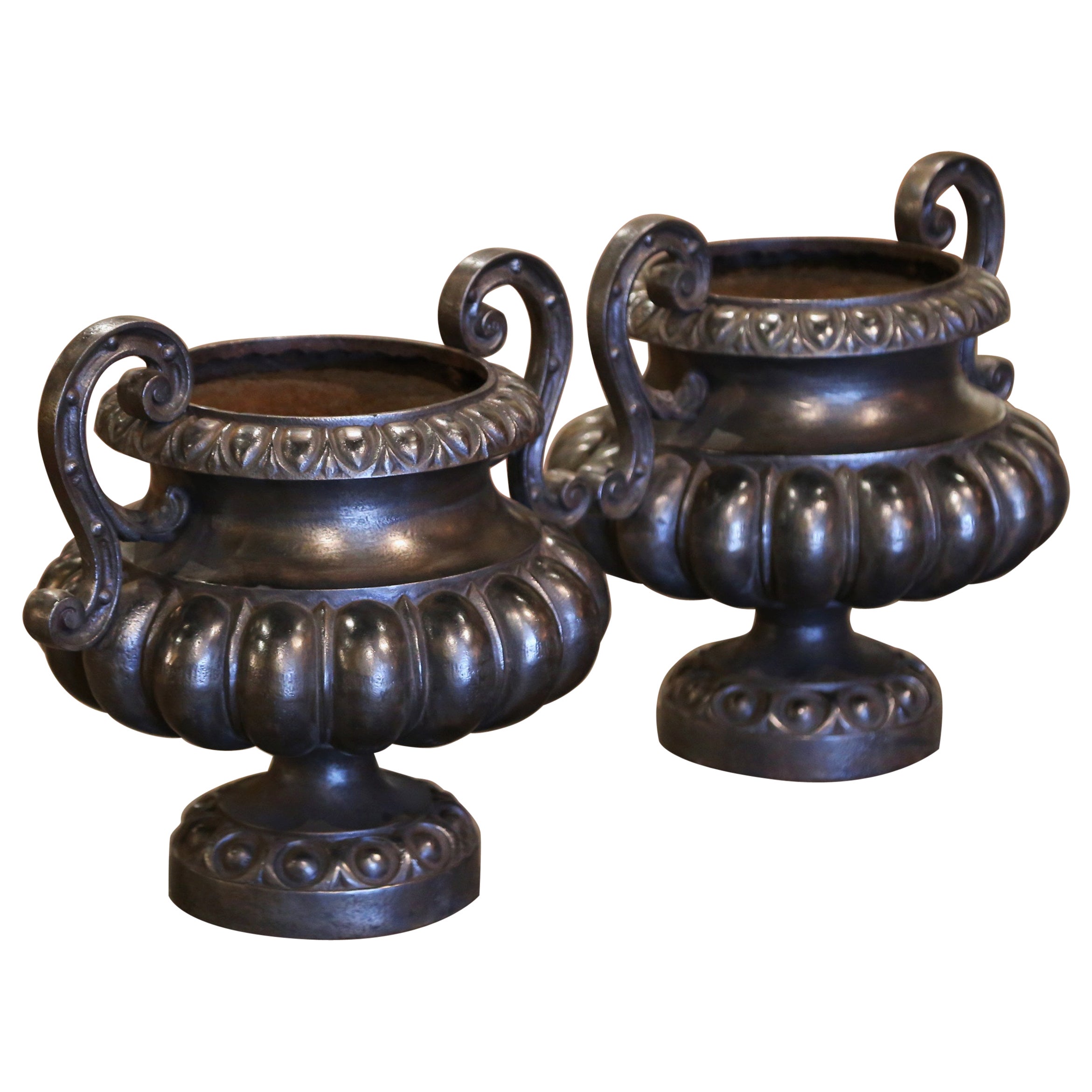 Pair of 19th Century French Neoclassical Polished Iron Garden Urn Planters For Sale