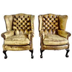 Pair of English Leather Tufted Wingback Armchairs C. 1900's