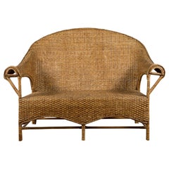 Loveseat vintage en rotin et bois avec dossier incurvé et bras inhabituels