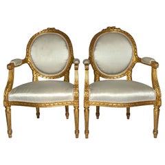 Pair Antique French Louis XVI Gold Leaf Armchairs, circa 1890