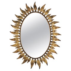 Sunburst Oval Mirror in Gilt Metal with Leafed Frame