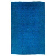 Blauer handgefertigter Overdyed-Wollteppich mit Allover-Motiv in Blau