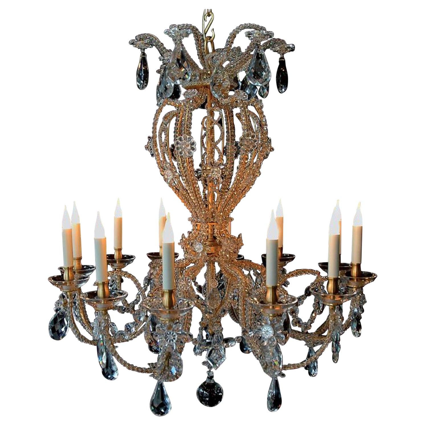 LU-FE-08203-12 Maison Baguès chandelier, 12 lights.
Various finish possible: leaf gilt gold strong patina, leaf gilt silver, black paint.

Iron and crystal.

Price is for leaf gilt gold finish - light patina. 

UL listing possible on request