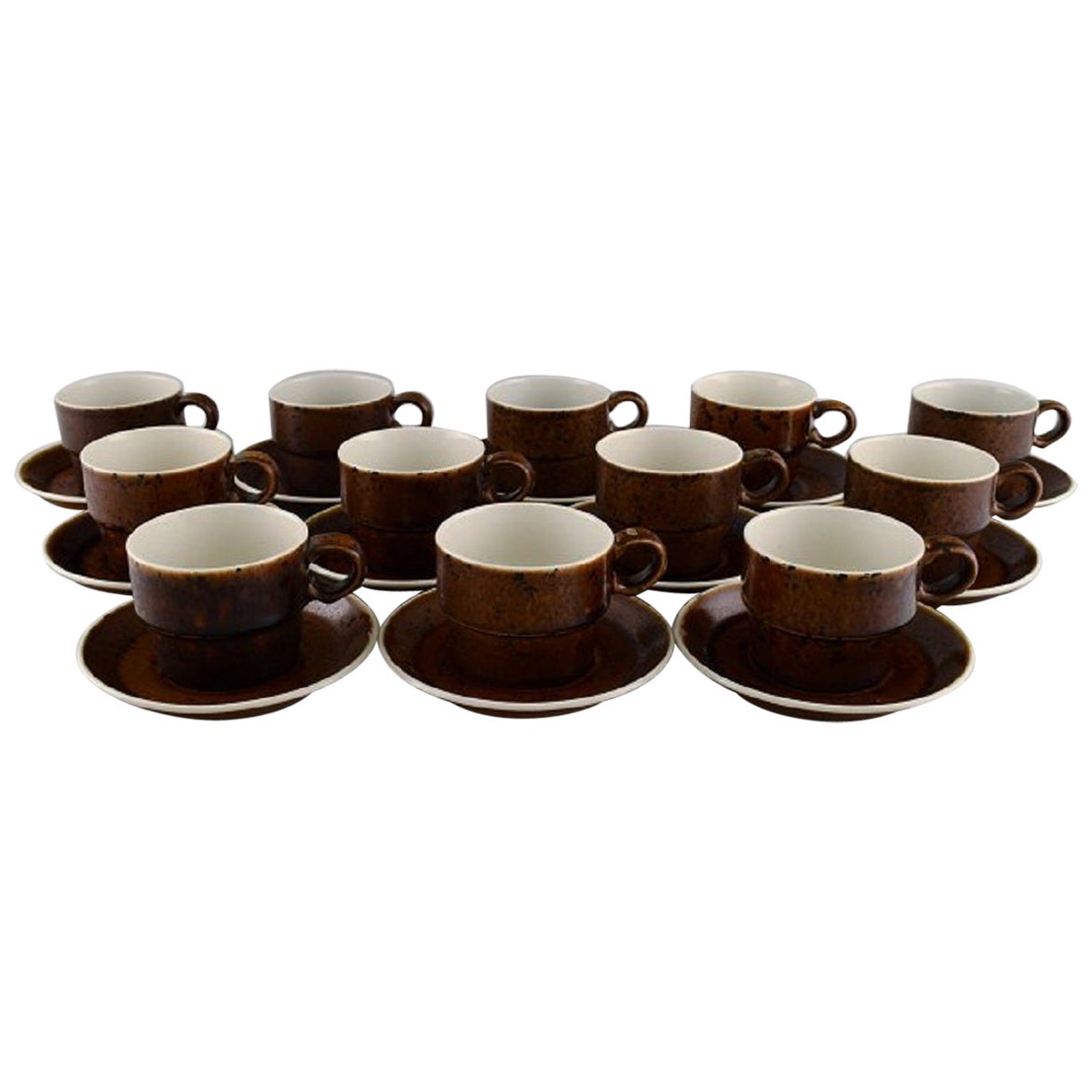 Stig Lindberg for Gustavsberg, Twelve Coq Coffee Cups with Saucers in Stoneware For Sale