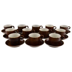 Stig Lindberg for Gustavsberg, Twelve Coq Coffee Cups with Saucers in Stoneware