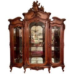Antique French Carved "Walnut Massif" Armoire with Beveled Glass Doors, Ca. 1870