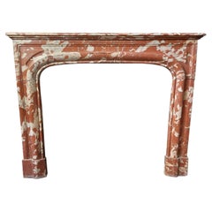 Antique fireplace mantle in "Francia red" marble, 19th century France