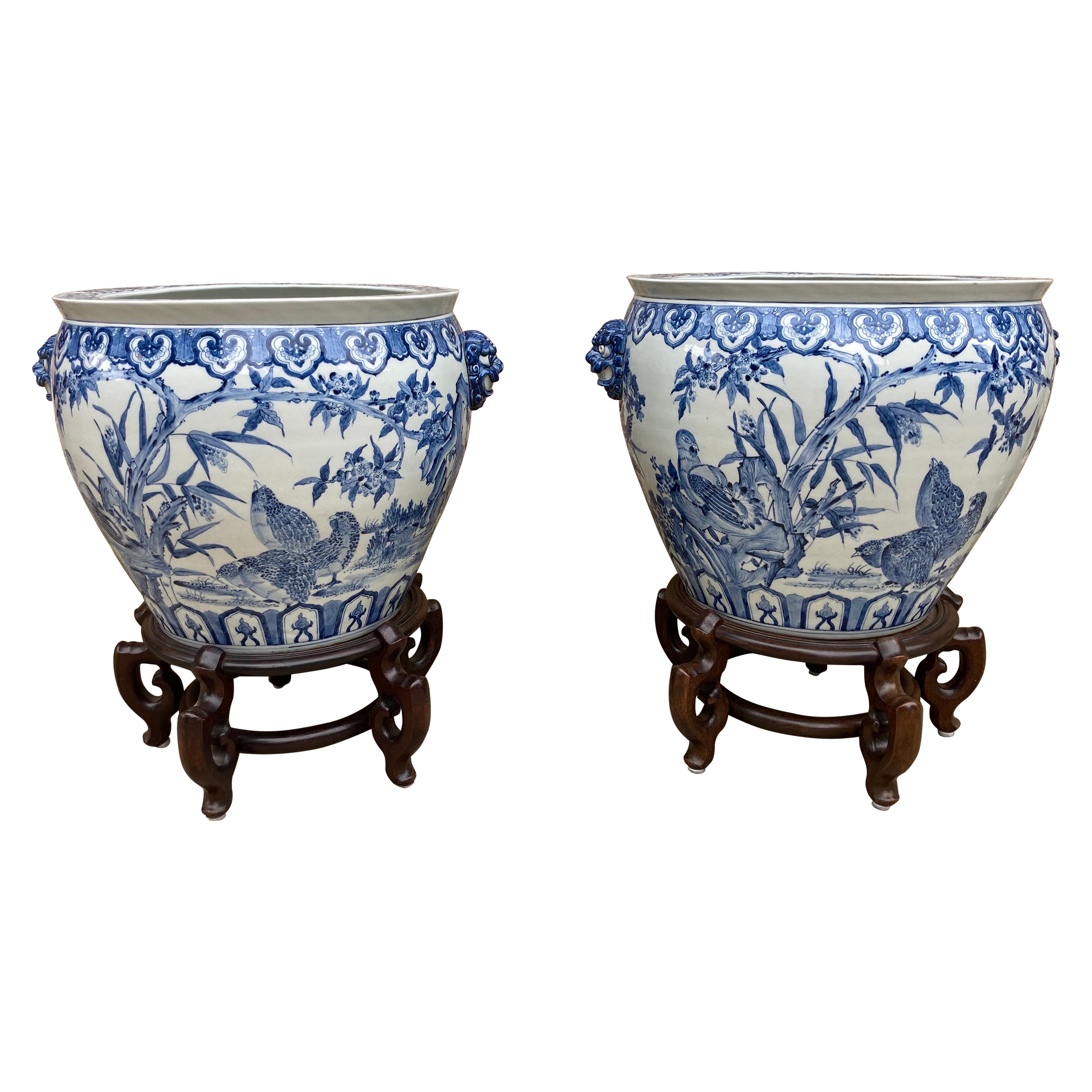 Pair of Large Chinese Blue and White Planters on Stands