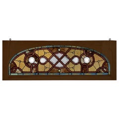 Late 19th Century Used Arched Stained Glass Transom Window New Wood Frame