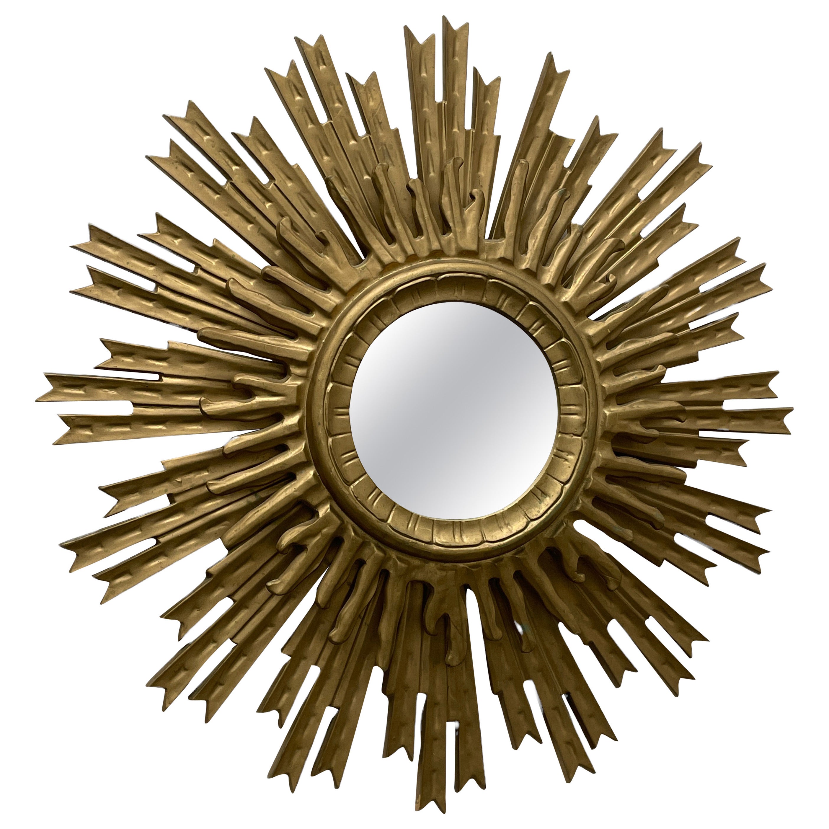 Grand miroir en forme d'étoile de soleil en plastique doré, fabriqué en Italie, vers les années 1960