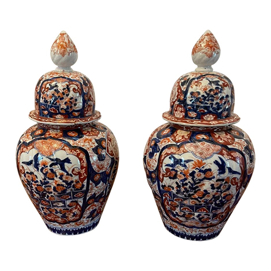 Fine Quality Pair of Antique Japanese Imari Lidded Vases For Sale