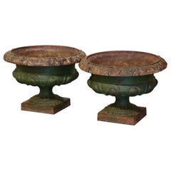 Pair of 19th Century French Neoclassical Weathered Iron Garden Urn Planters